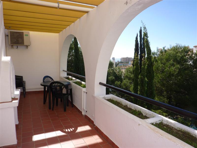 view of terrace, gardens and sea